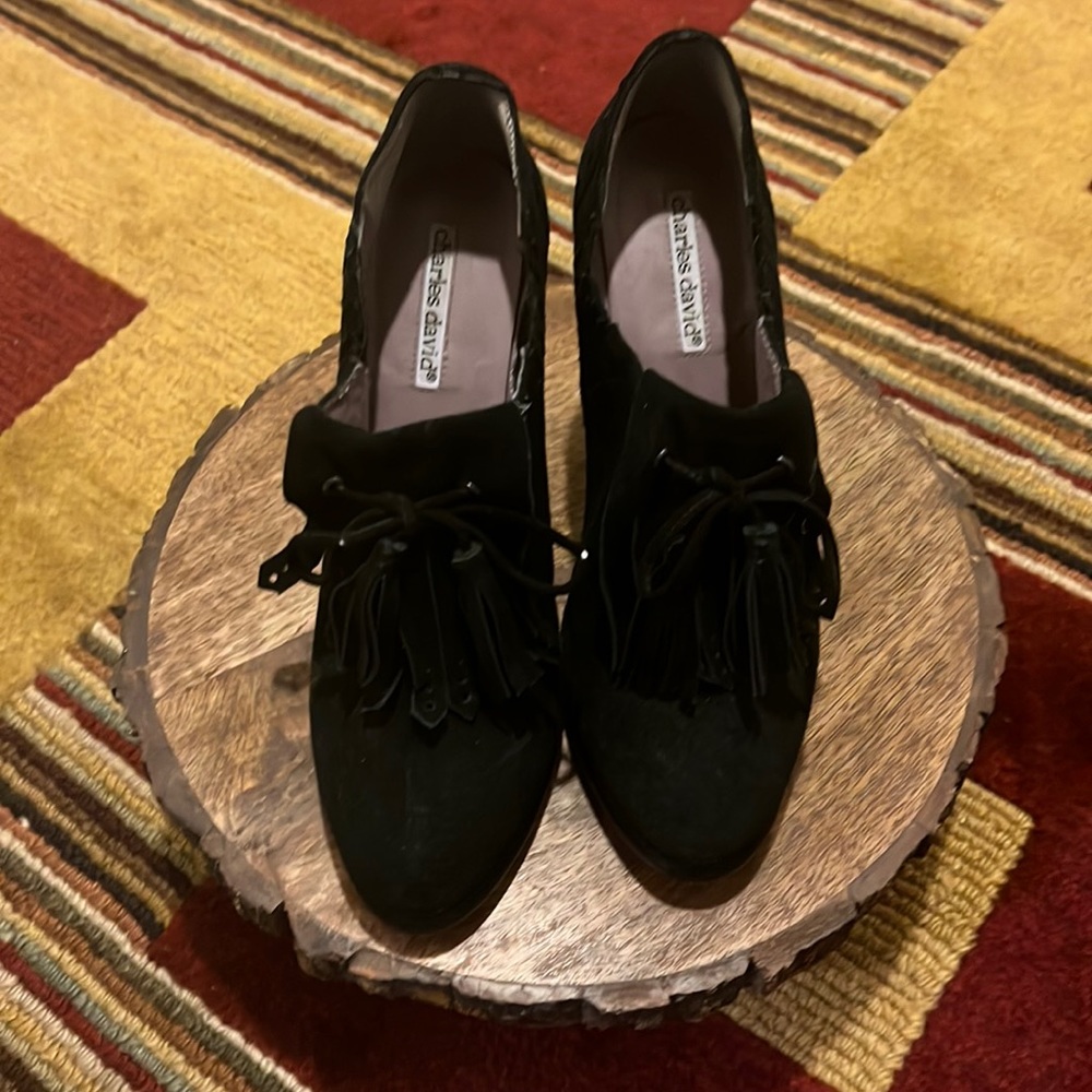 Never been worn suede fringe bootie. Size 8.5 6 inch heel.